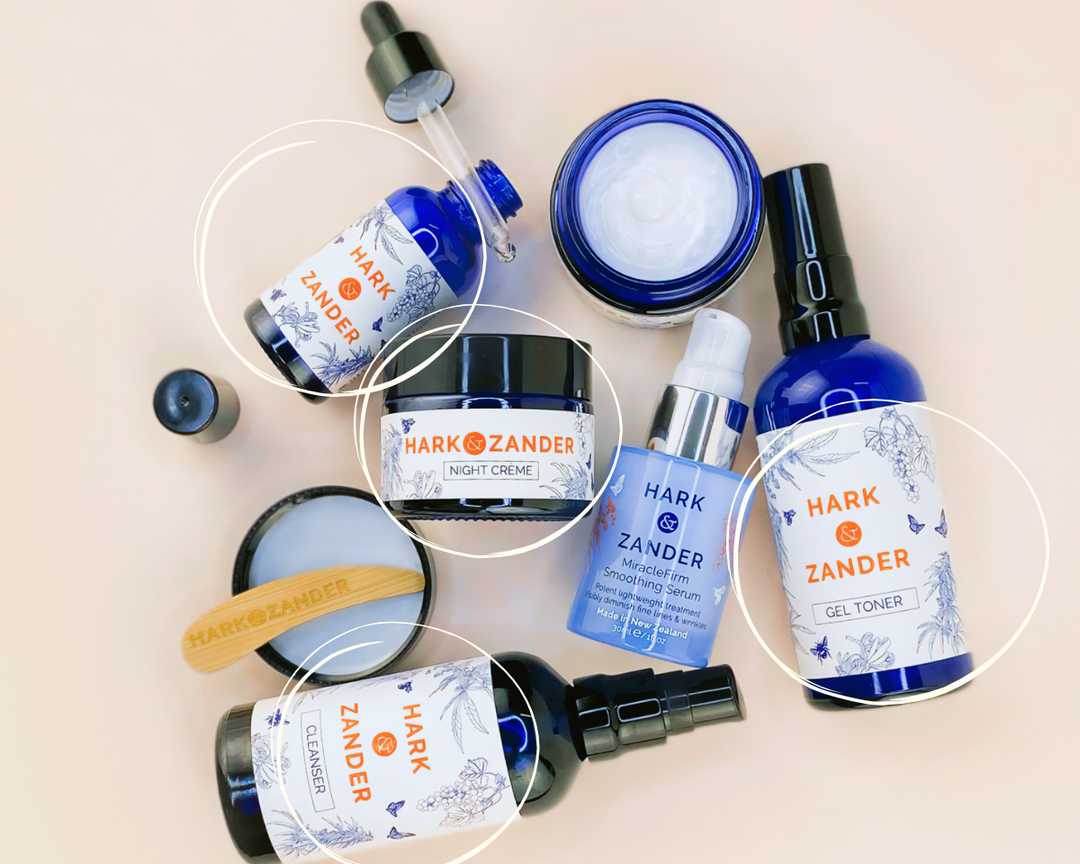 Hark & Zander skincare products on a beige background. Create Your Own Bundle - Signature Four